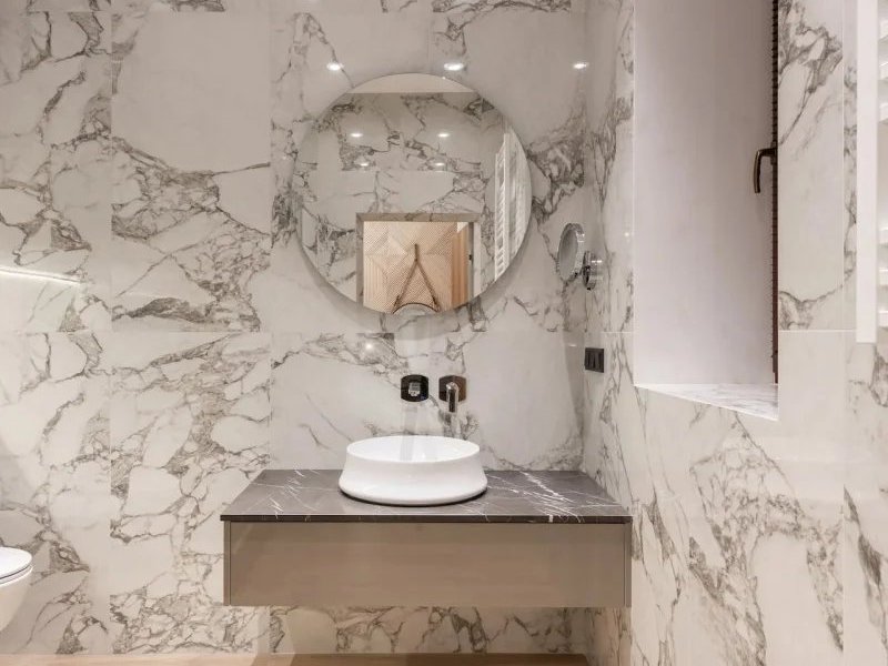 Grey distressed tiles on kitchen wall